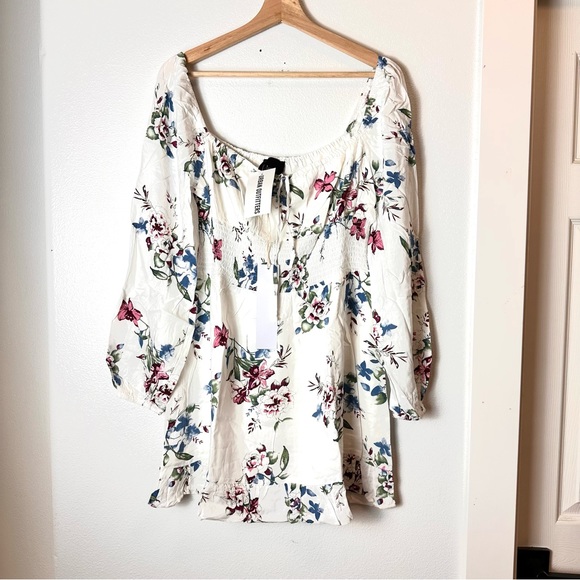 Urban Outfitters Dresses & Skirts - NWT Urban Outfitters White Floral Long Sleeve Smocked Waist Ruffle Hem Mini Dres